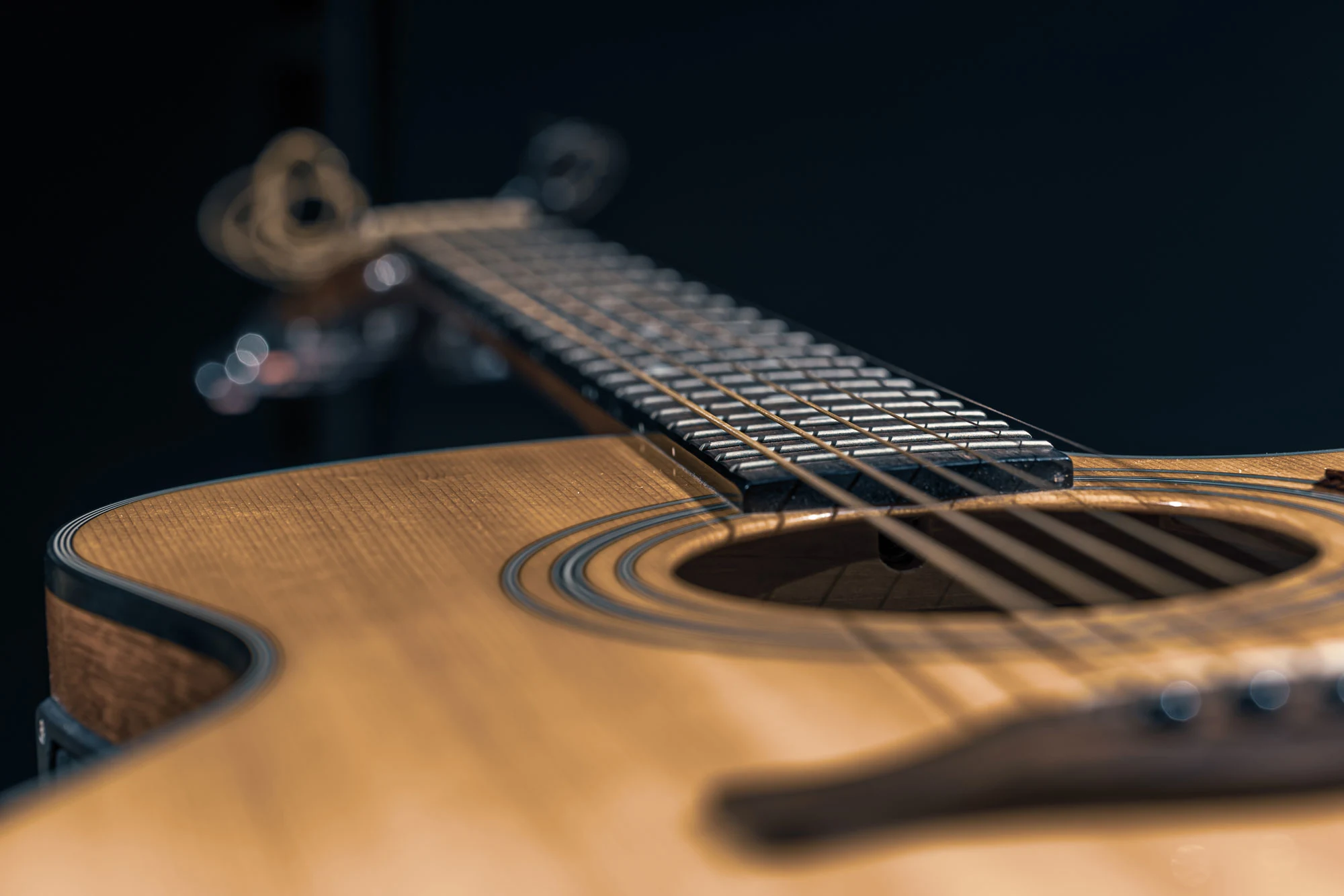 Close Up Of An Acoustic Guitar On A Dark Backgroun 2026 01 09 08 12 01 Utc2 2